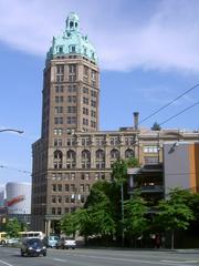 Sun Tower building in Vancouver with ornate architecture under blue sky