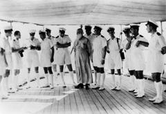 Naval priest Dionysios Papanikolopoulos with officers on Greek cruiser Georgios Averof before 1944