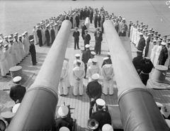 Greek Independence Day celebration in the Greek Navy on 23 February 1943 at Port Said with sailors on the quarterdeck of cruiser HHMS Giorgios Averoff