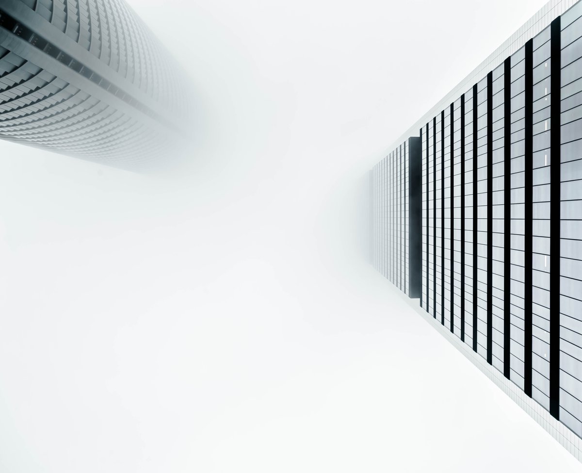 Cityscape of Madrid, Spain enveloped in dense fog