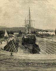 Woodcut of Arsenale della Spezia shipyard showing the new Umberto I dry dock with the transport ship America under repair