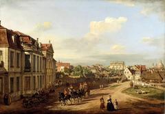 Historical city square with ornate iron gate and classical buildings