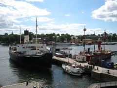 Four floating museum ships at Vasa Museum including Sankt Erik ice breaker, Finngrundet lighthouse ship, Spica minelayer, Bernhard Ingelsson rescue ship