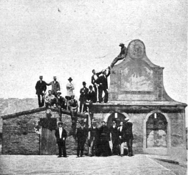 Group of Catalans in front of the old bell tower of the Convent of San Carlos Borromeo in San Lorenzo, Argentina, circa 1910