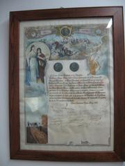 Historical document establishing the placement of the cornerstone for a monument in Campo de la Gloria, 1913