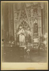 Interior of Cathédrale Saint-André de Bordeaux showing altar with statue of Virgin and Child