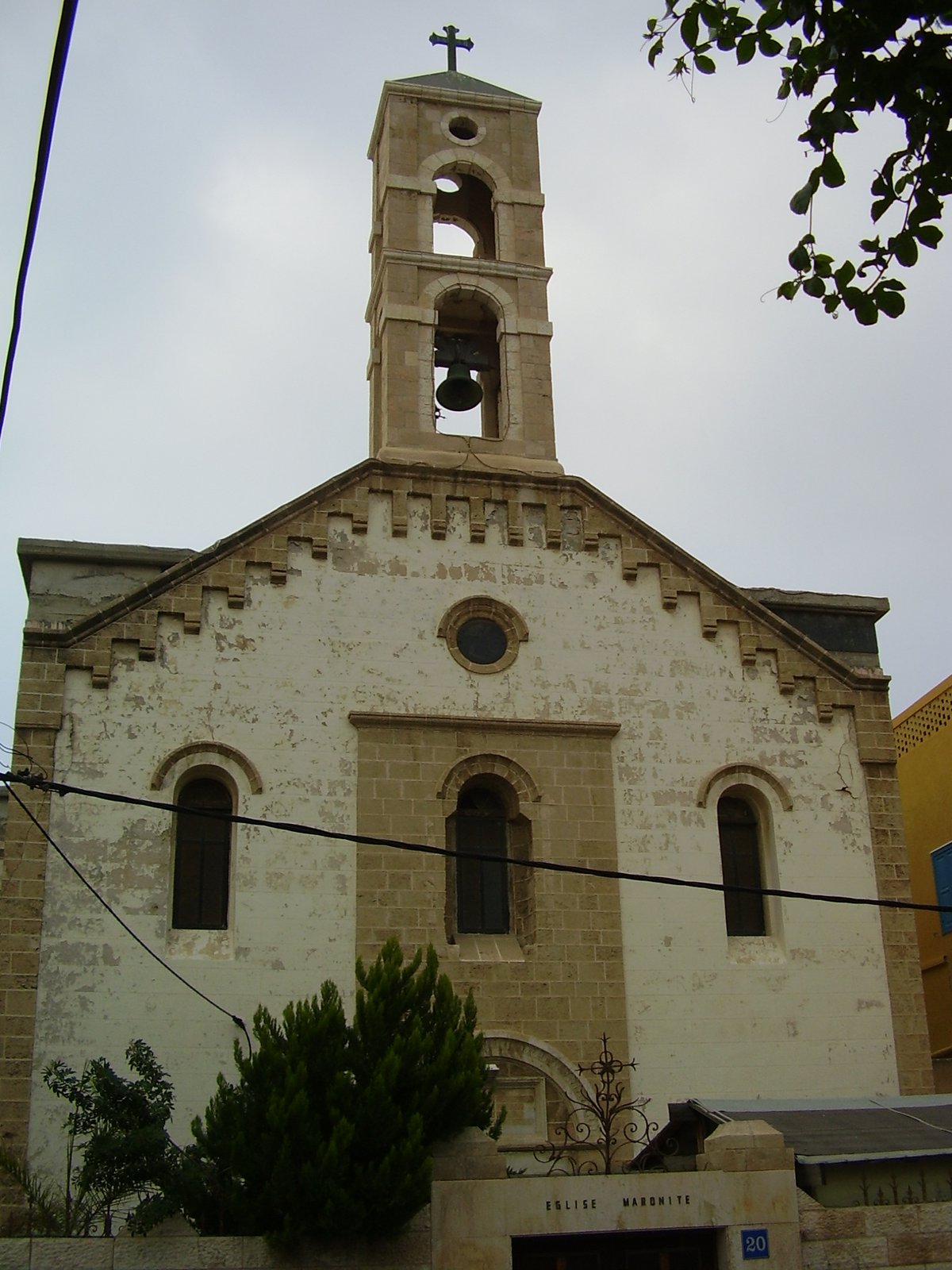 Maronite Church in Jaffa, Israel with white stone walls and bell tower