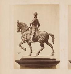 Metal sculpture of a rider on horseback
