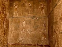 Mortuary Temple of Queen Hatshepsut in Luxor, Upper Egypt with colonnades and surrounding desert landscape