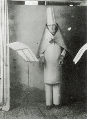 Studio portrait of Hugo Ball for Cabaret Voltaire invitation postcard 1916