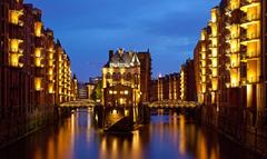 Speicherstadt warehouse district illuminated at night in Hamburg