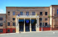 Front view of the Universidad Católica Nuestra Señora de la Asunción campus building with clear sky