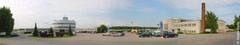 Aerial panorama view of Helsinki-Malmi Airport with runways, terminals and surrounding green landscape