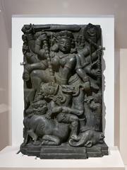 Durga warrior goddess killing demon buffalo stone relief from Odisha