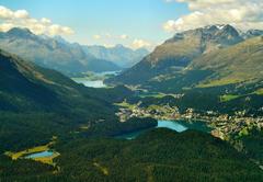 Panoramic view of Upper Engadine valley with lakes Staz, St. Moritz, Silvaplana, and Sils from Muottas Muragl