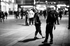 People walking and gathering in Kabukicho nightlife district, Tokyo