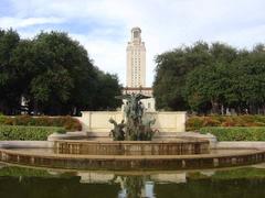 UT Austin Littlefield Fountain with Tower in Background during Autumn