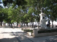 View of Jardim De São Pedro De Alcântara park with cityscape in Lisbon Portugal
