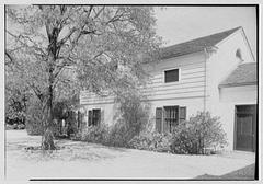 Historic black and white photograph of Mr. and Mrs. Edgar B. Stern at their residence at 11 Garden Lane, New Orleans, Louisiana