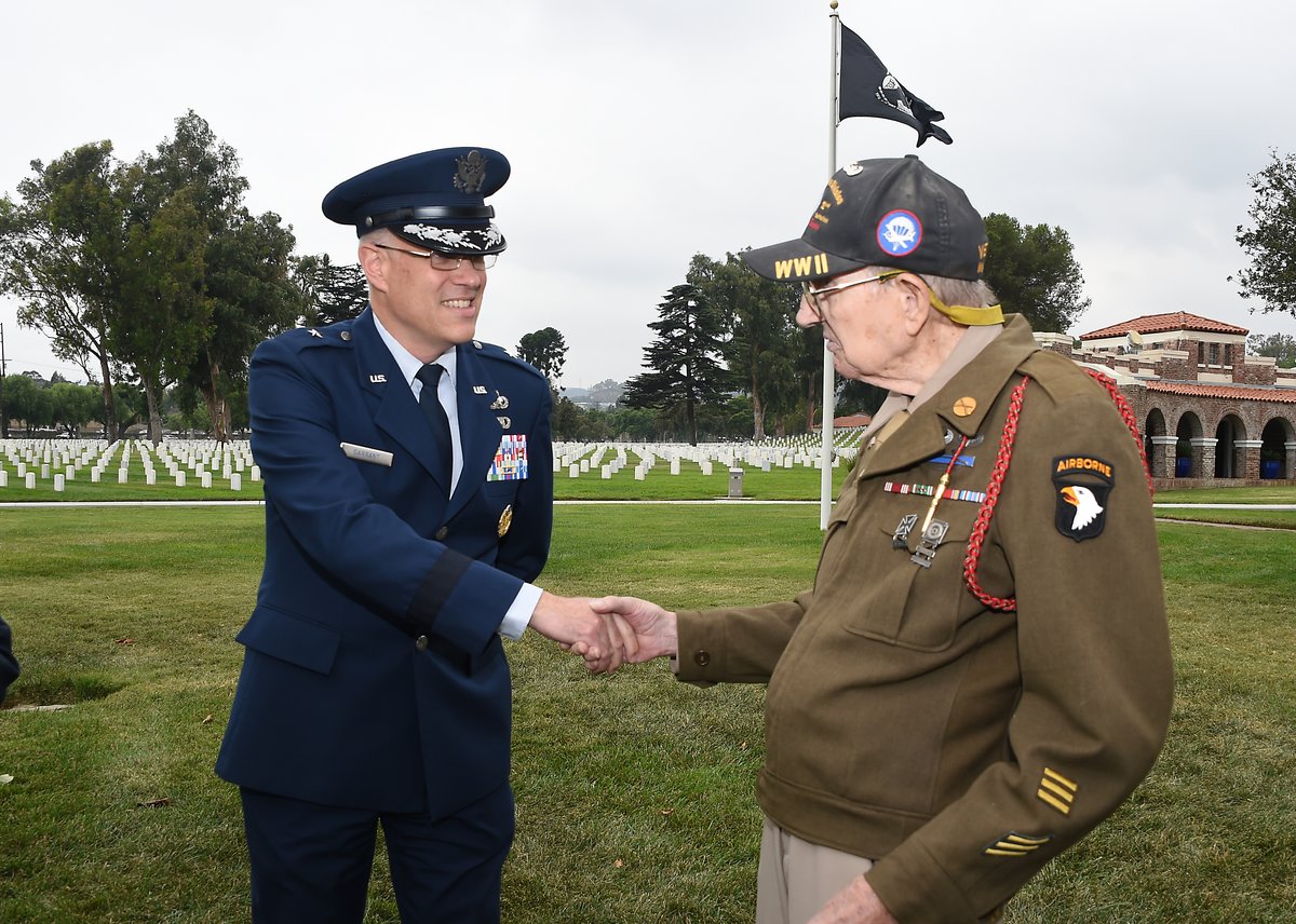 Brigadier General Philip Garrant meets World War II Veteran Henry Ochsner at National Order of the Legion of Honor ceremony