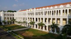 Loyola College main building with classical architecture under clear blue sky