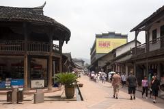 Main street of Luodai ancient town in Sichuan China with traditional buildings and lanterns