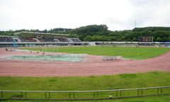 Machida-city athletic stadium exterior with clear blue sky