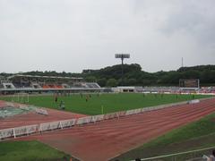Exterior view of Machida Municipal Stadium with clear sky