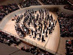 Elbphilharmonie concert hall exterior illuminated at night after Bruckner's 9th Symphony performance