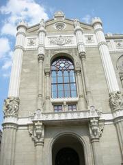 Friezes on large columns of Pesti Vigadó facade depicting music and dance themes in Budapest