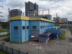 Electrical substation in Kuala Lumpur Malaysia with high voltage power lines and transformers