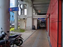 Maluri LRT entrance in Kuala Lumpur, Malaysia with modern architecture and cityscape