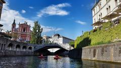 Scenic view of Ljubljana cityscape with Ljubljanica River and Dragon Bridge