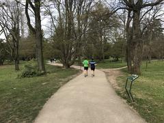 Entrance gate and main path of the Botanical Garden of Geneva in spring