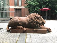 Two lion sculptures at the Park Avenue entrance of Maryland Historical Society in Baltimore, MD