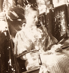 Francese Litchfield Turnbull seated in rocking chair with family at La Paix estate near Towson MD