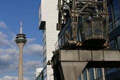 Rheinturn and crane number 31 viewed from Neuer Zollhof in Düsseldorf on September 26, 2015