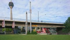 Apollo Varieté building with colorful signage and bright lighting at night