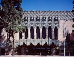 Brightly painted 1927 Mayan Theater entrance with seven warrior-priests sculptures in Los Angeles