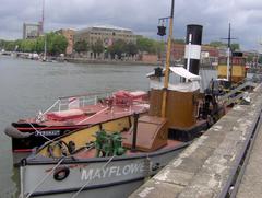 Fireboat Pyronaut and steam tug Mayflower docked outside Bristol Harbour Railway and Industrial Museum