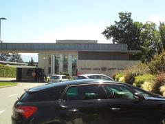 Visitors entering United Nations Geneva through main entry gate