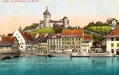 Historic paddle steamer GD Neptun docked at Schaffhausen harbor before World War I