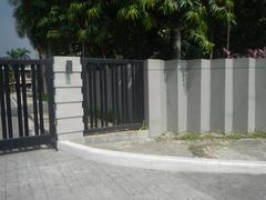 Mehan Garden with lush greenery and historical buildings in Ermita, Manila city