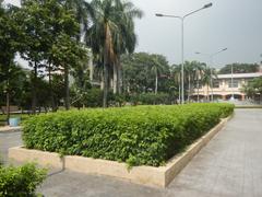Mehan Garden with green trees and walking paths in Ermita, Manila near Universidad de Manila