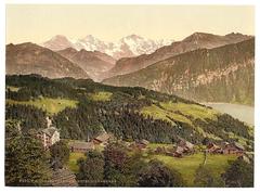 Scenic view of Beatenberg village and Hotel Silberhorn in Bernese Oberland, Switzerland with mountains in the background
