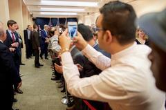 U.S. Secretary of State John Kerry greets U.S. Embassy Riyadh workers and families
