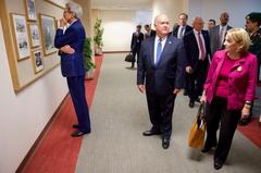 U.S. Secretary of State John Kerry and officials viewing display of U.S. Presidents and Saudi Kings at U.S. Embassy Riyadh