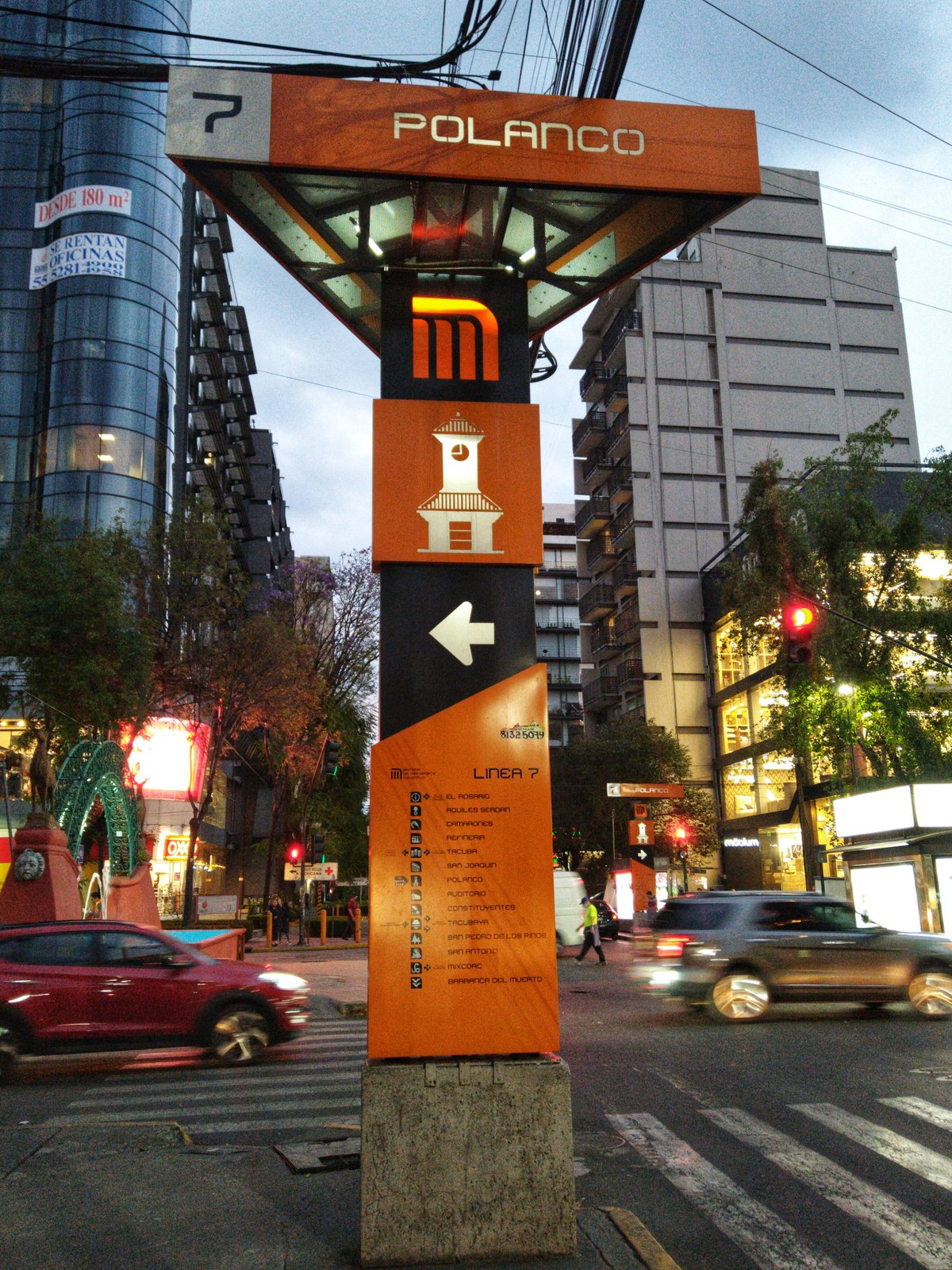 Street view of Polanco neighborhood in Mexico City with modern buildings and traffic