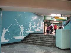 Metro station Santa Anita stairs with mosaic of men in boats
