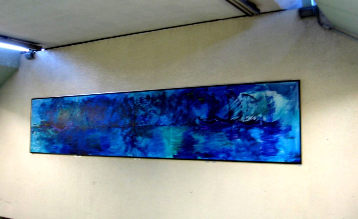 A colorful painting titled 'A Landscape of Color for Everyone' displayed in Santa Anita Metro Station, Mexico City